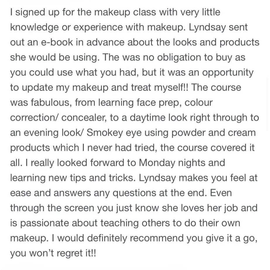 A close-up photo of a printed text review about a makeup class signed up for by someone with little knowledge or experience in makeup, detailing their positive experience and recommendation.