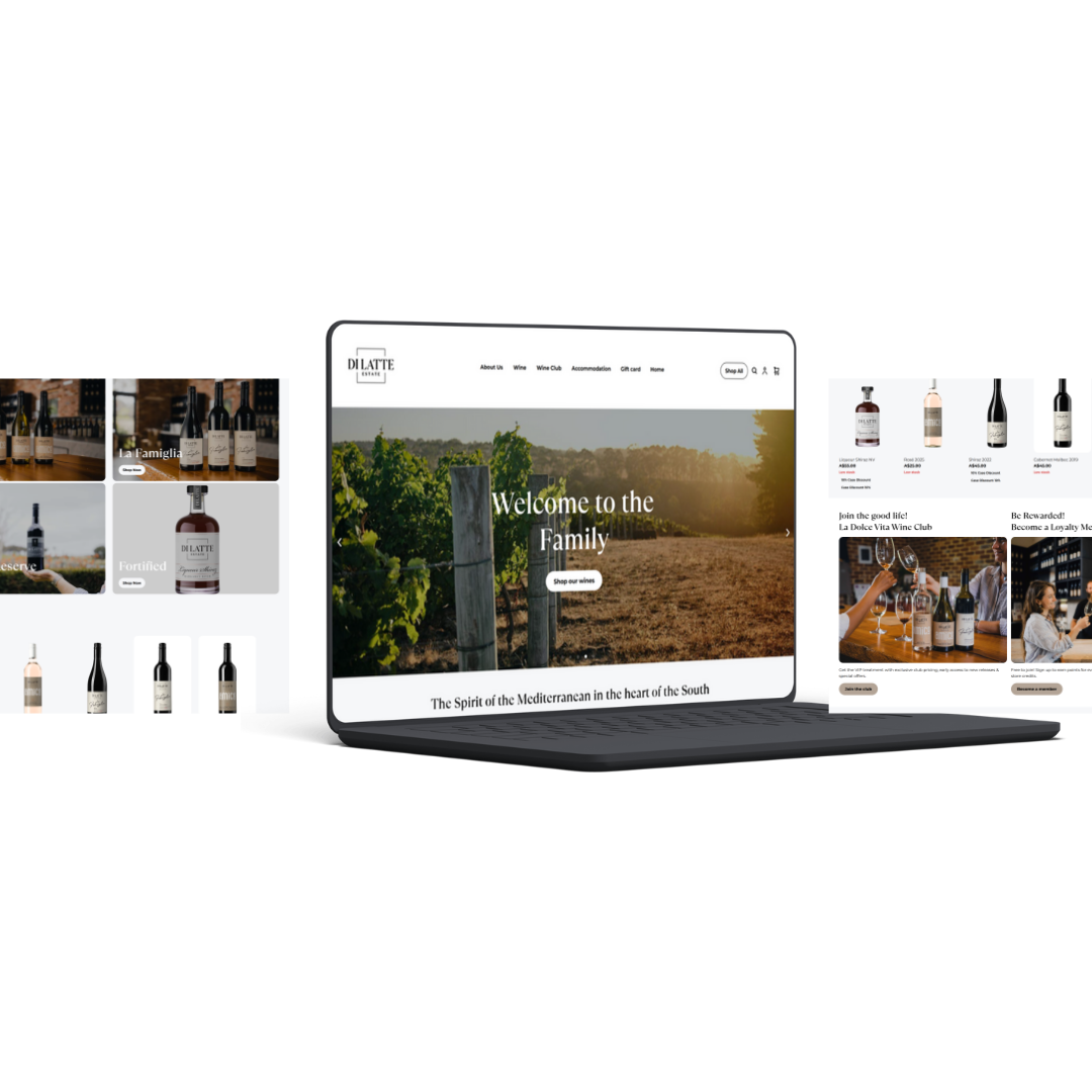 Laptop and smartphone displaying a real estate website with images of modern houses and scenic landscapes.