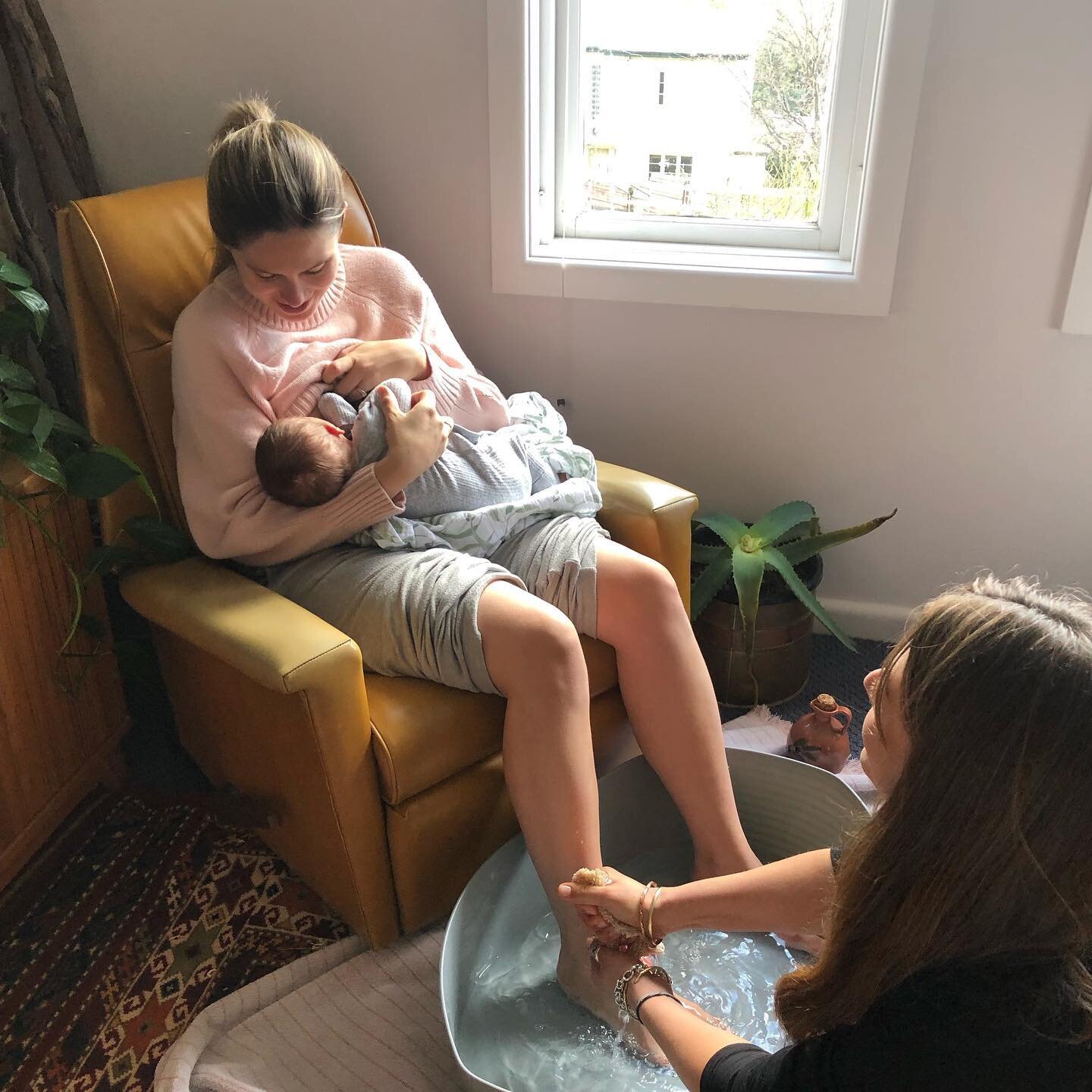 Here I am at roughly 3 weeks postpartum. 

I&rsquo;m receiving a foot soak from my sister-in-law. 

When that finished (as all good things do), I had some gentle bodywork done by my other sister-in-law.

After they each finished weaving their magic o