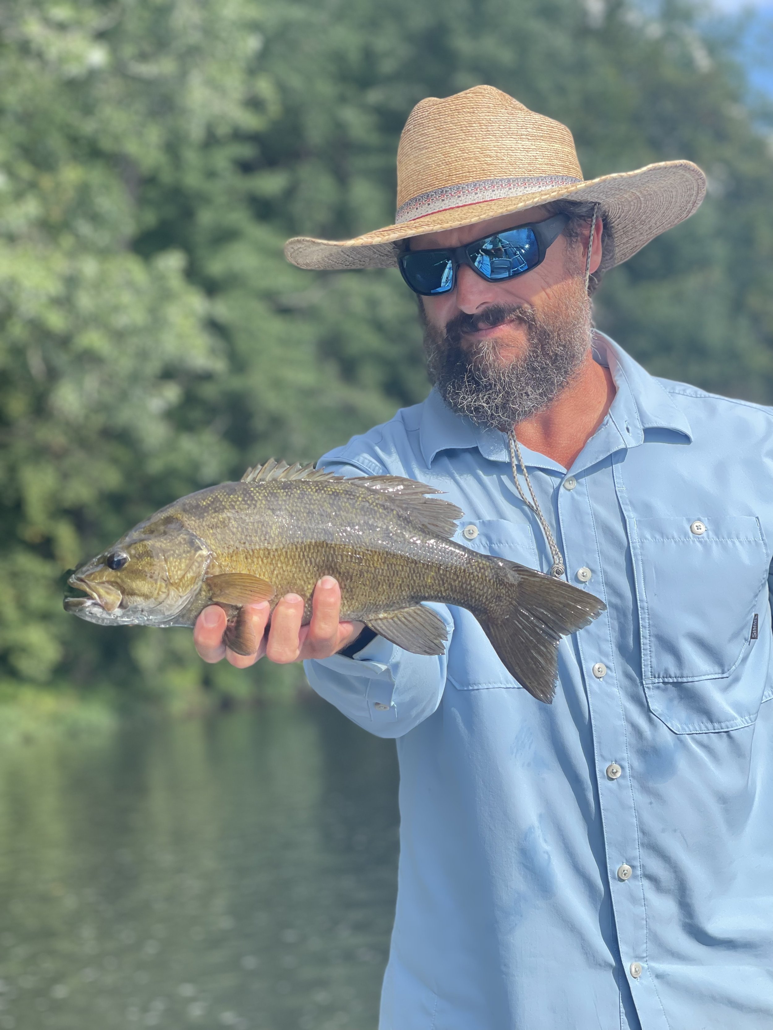 Jeremy Cunningham catching a big smallmouth bass