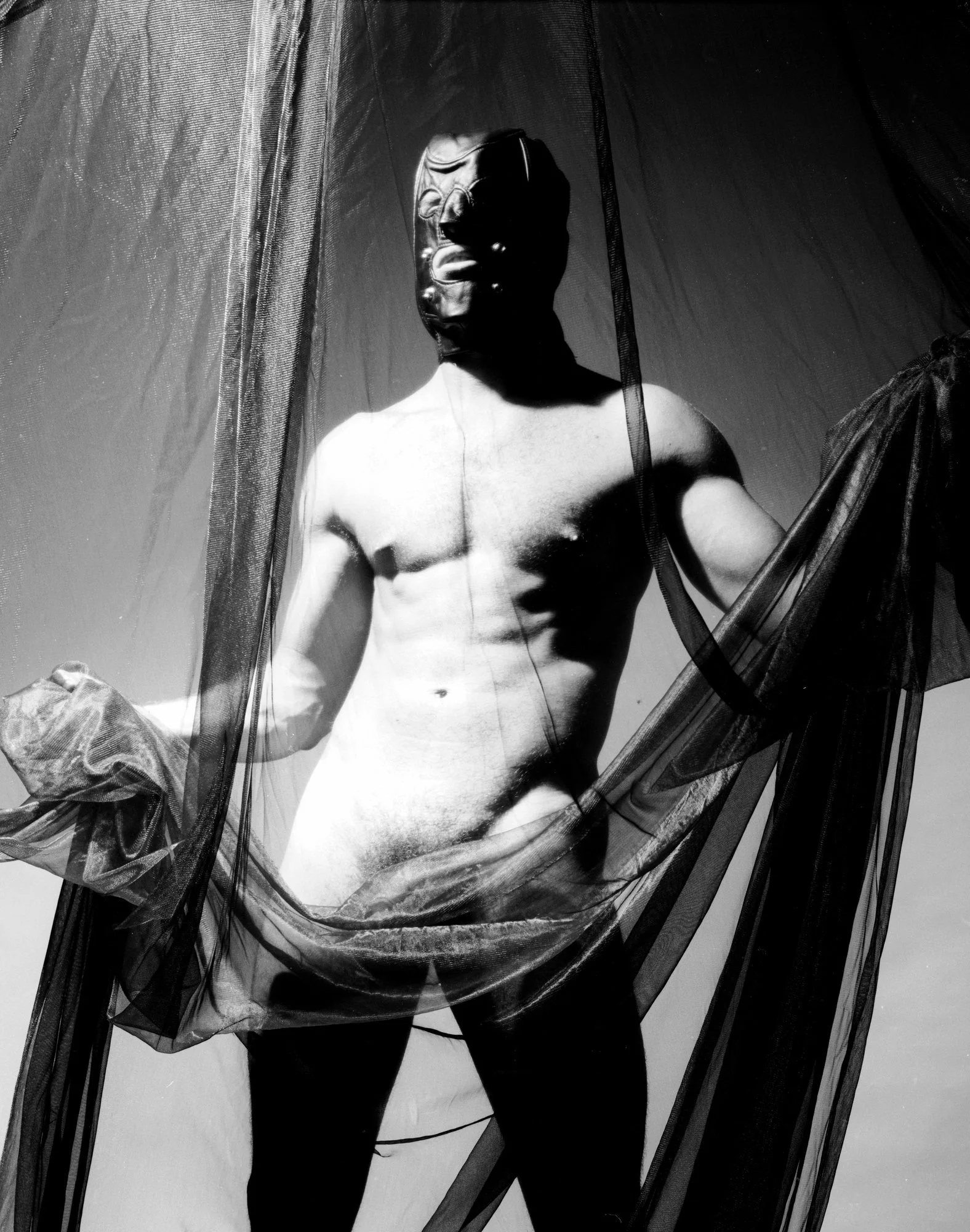 Masked figure with sheer drapery, 1990