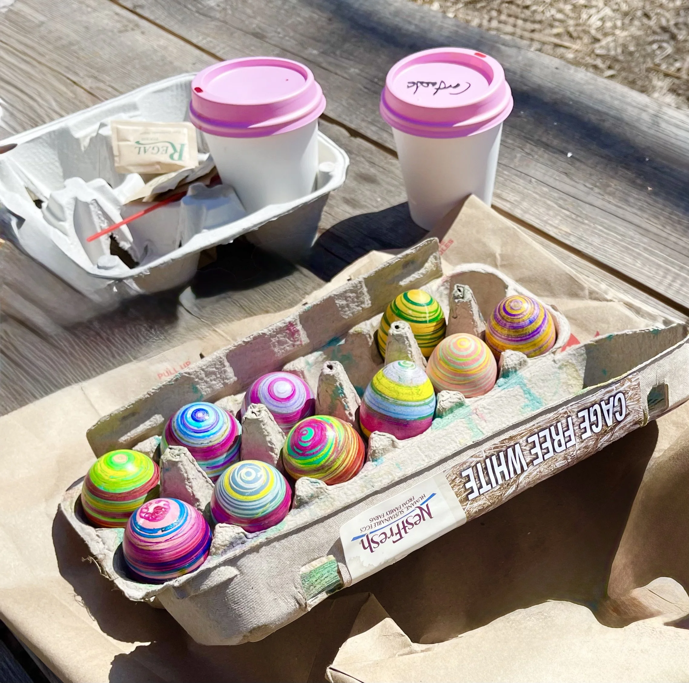 EASTER carton of dyed eggs 2 postmark coffees pink lids IMG_6129.jpeg