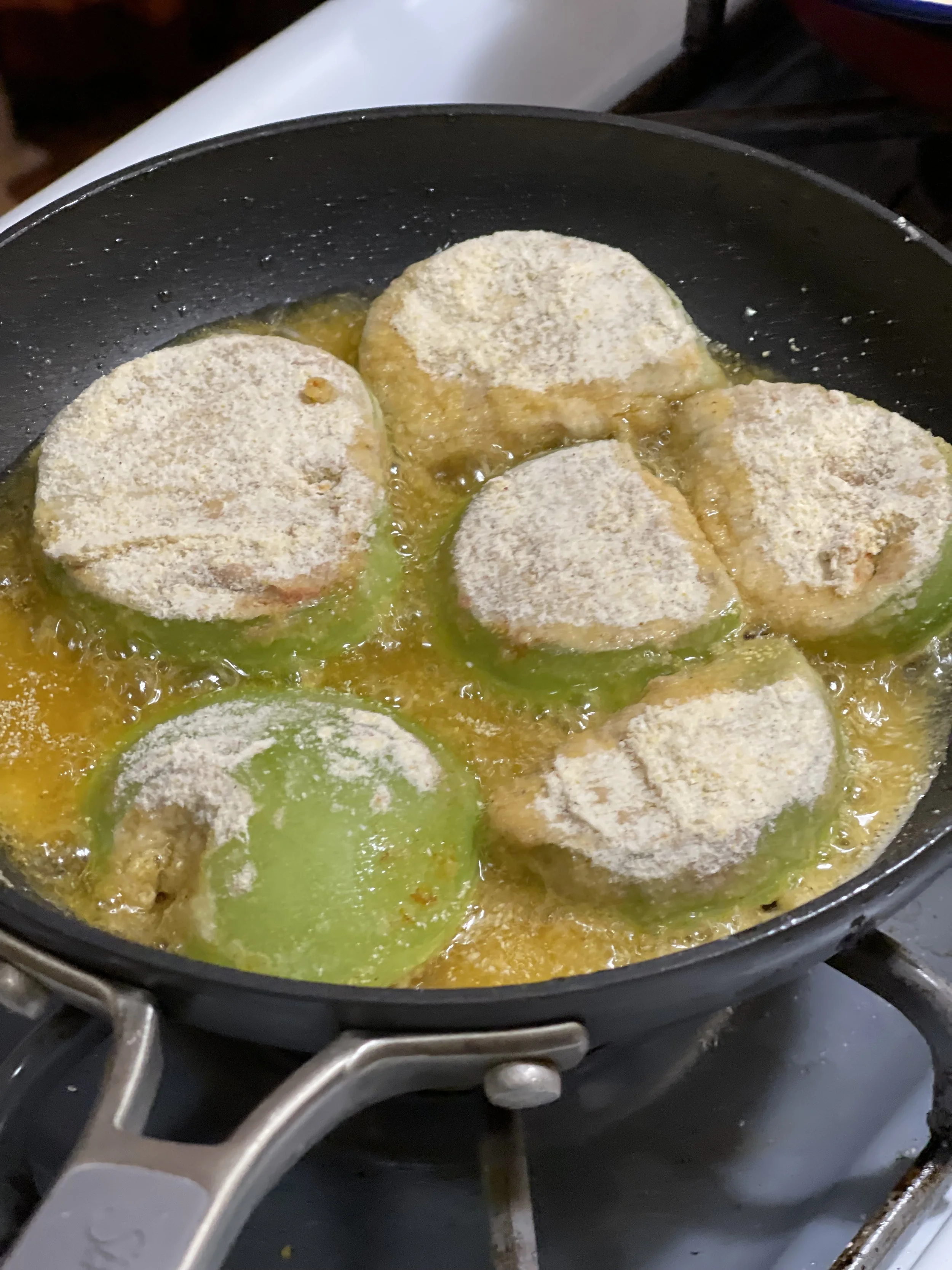 GREEN TOMATOES_FRYing in skillet IMG_6465.jpeg