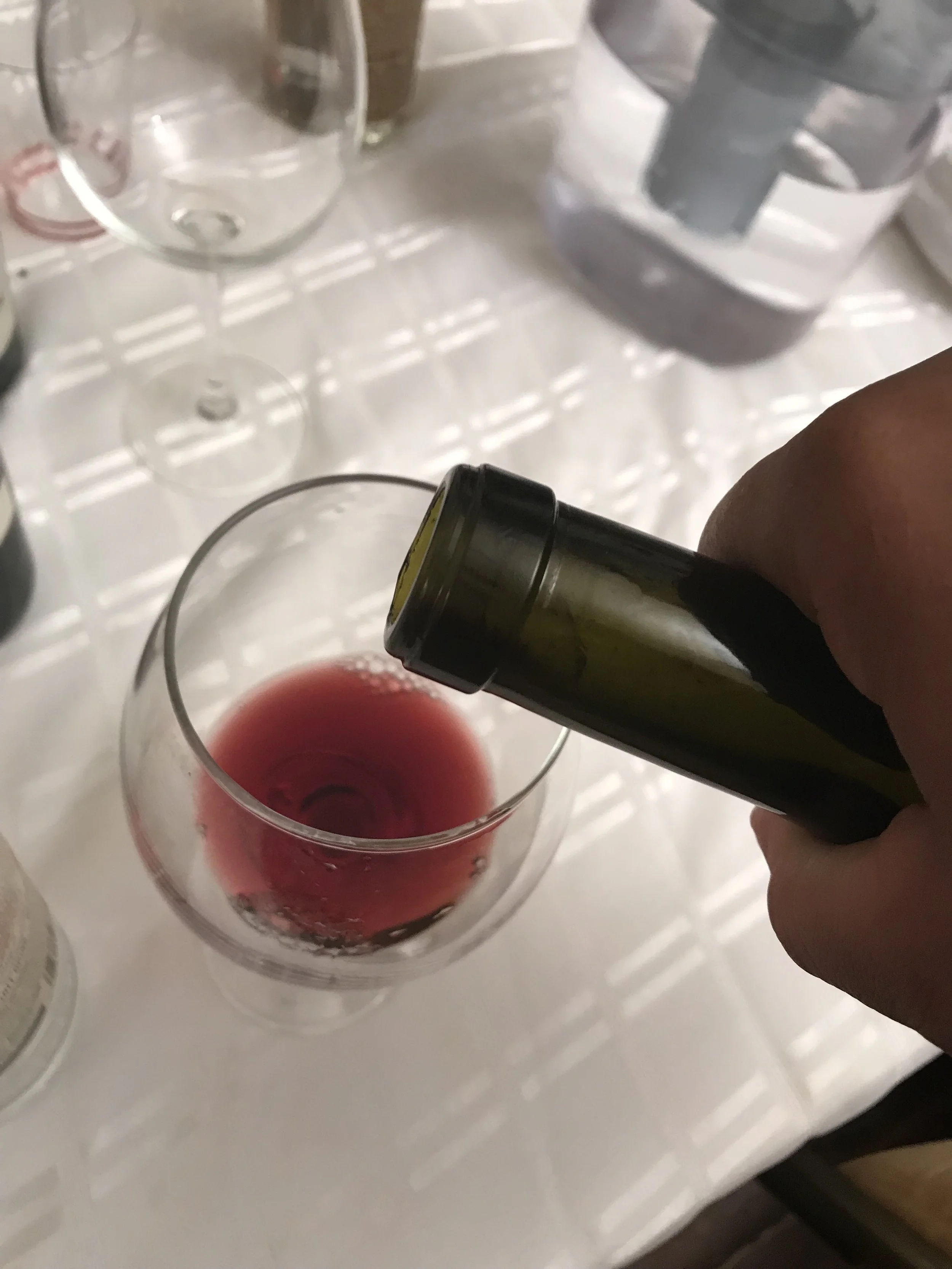 Wine_pouring a glass of red IMG_8887.jpeg
