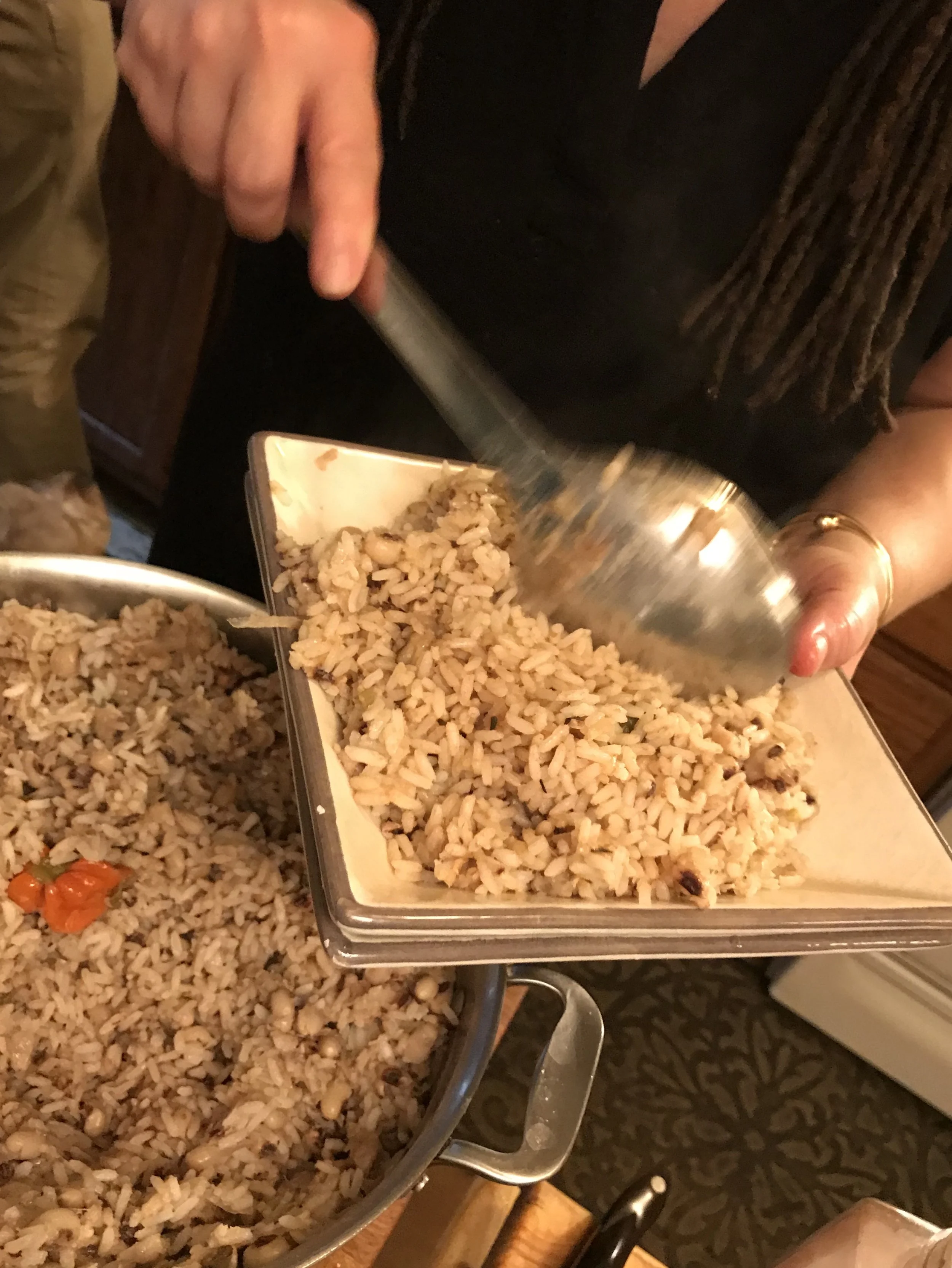 Easter Rice n Peas_HJ serving up IMG_1052.jpg