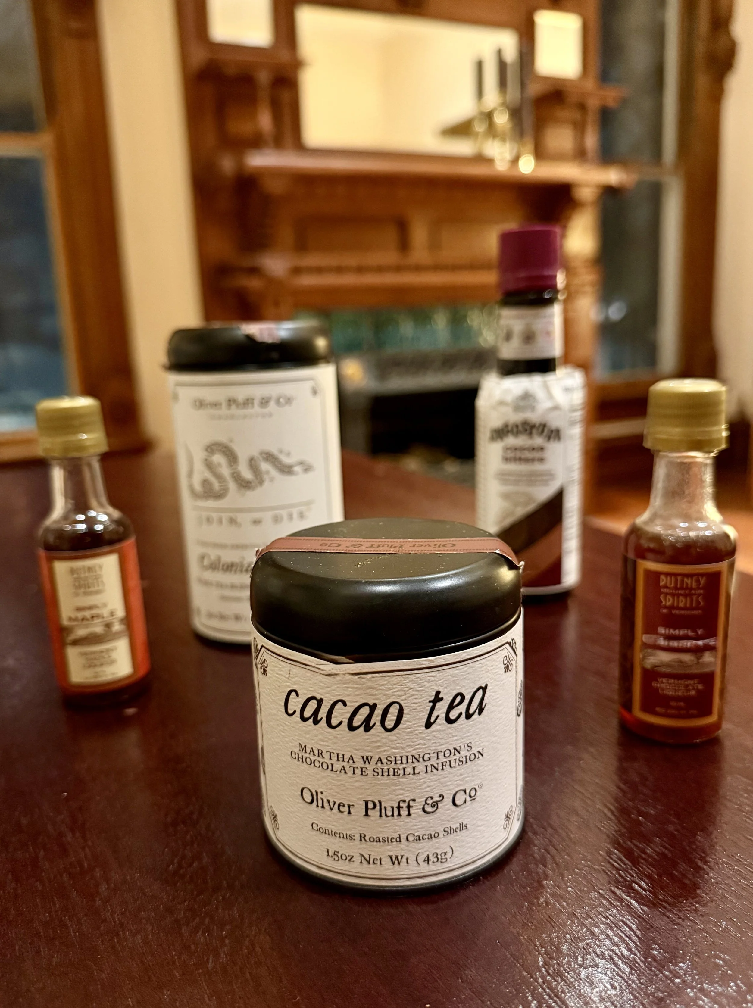 TEA_Colonial American Cocktai concocting ingredient line up in gilded living room IMG_6576.jpeg
