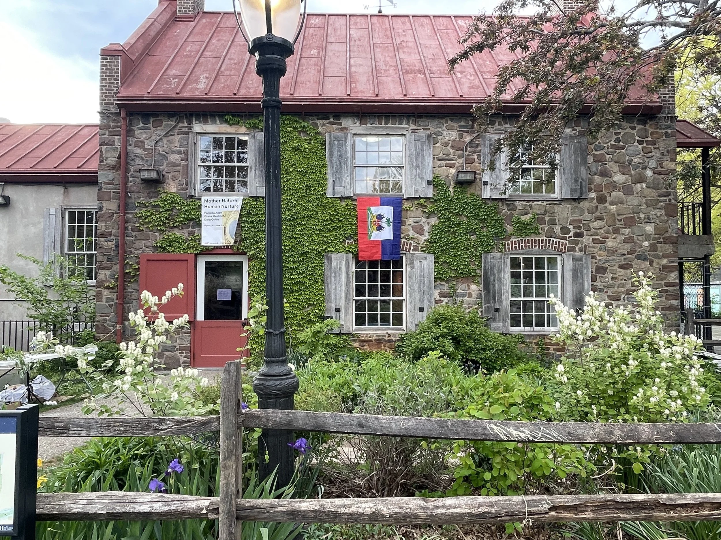 OSH full view haitian flag draped from window IMG_6837.jpg