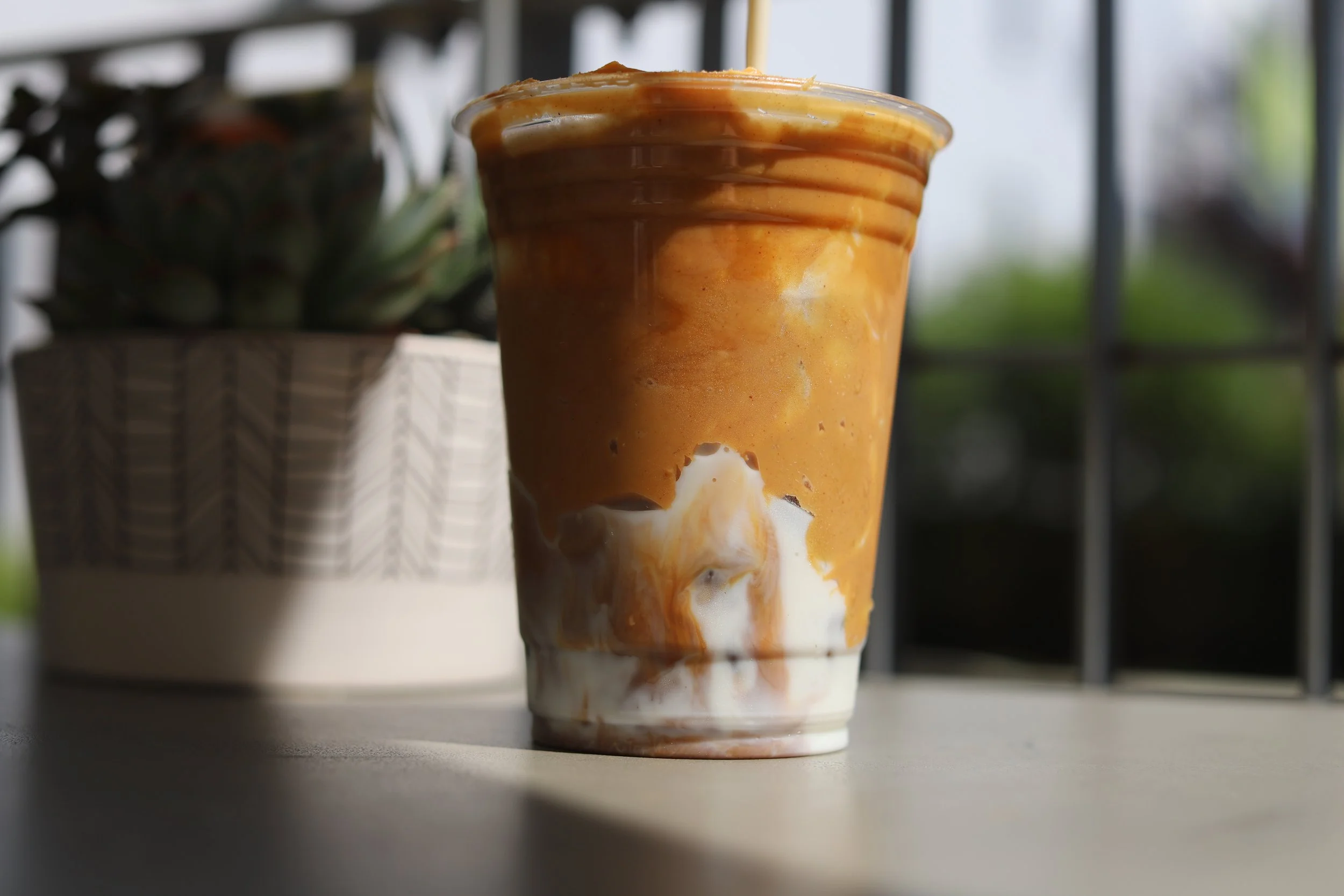Peanut Butter mixed with Honey, Oat Milk, and Espresso to create a creamy delicious drink.