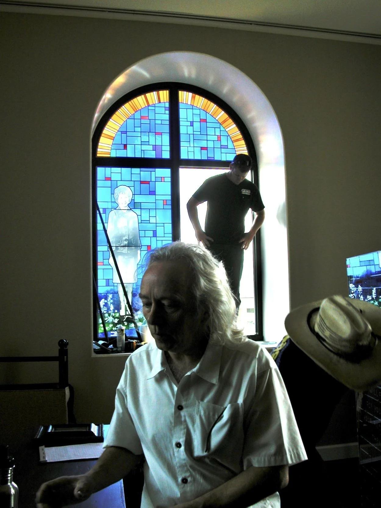  Don Young during installation of glass panels, 2012. 