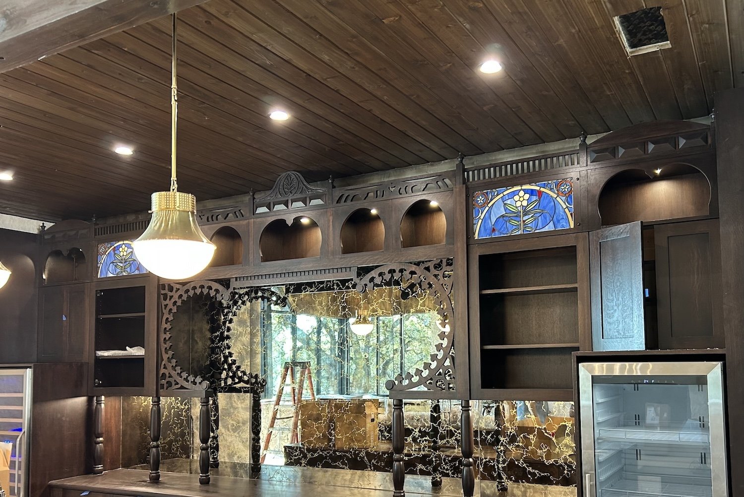 Texas Saloon bar, 2025. Wood work by Reznikoff Custom Furniture.