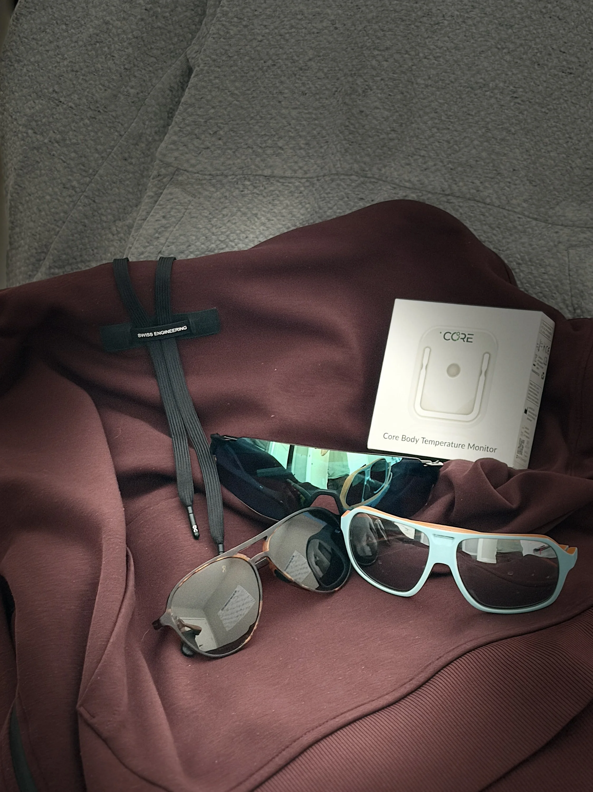 On Tech hoodie and Roka sunglasses