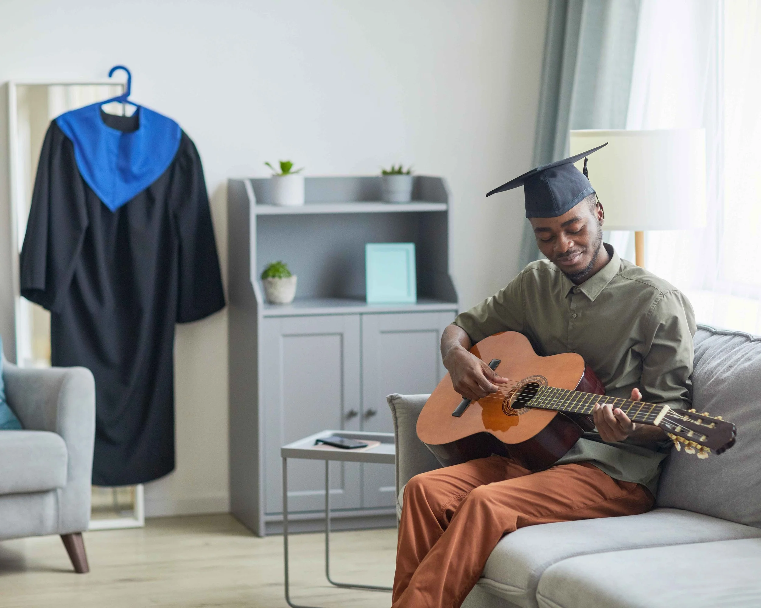 school-graduate-playing-guitar-2023-11-27-05-20-33-utc.jpg