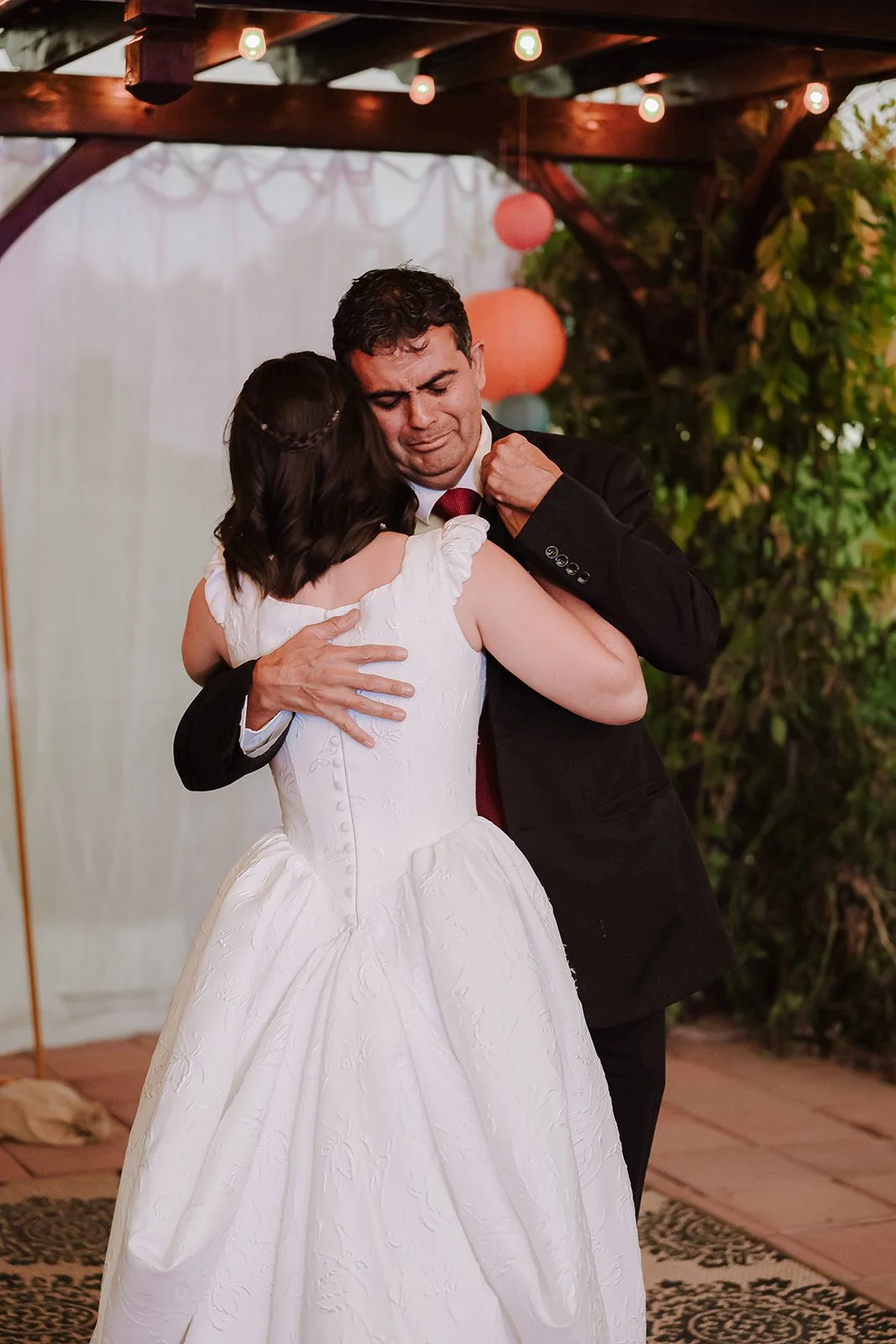 Photograph of a bride with her father at an LDS wedding reception in Syracuse, Utah
