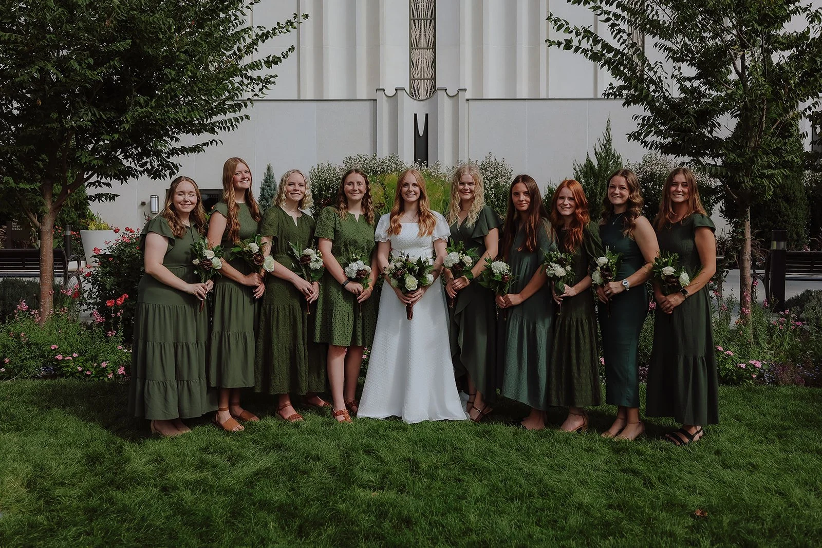 Bride with bridesmaid in green dress at the jordan river temple