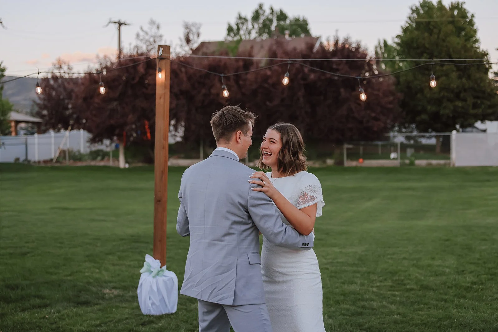 Photograph of a bride and groom's first dance at a wedding in Heber City