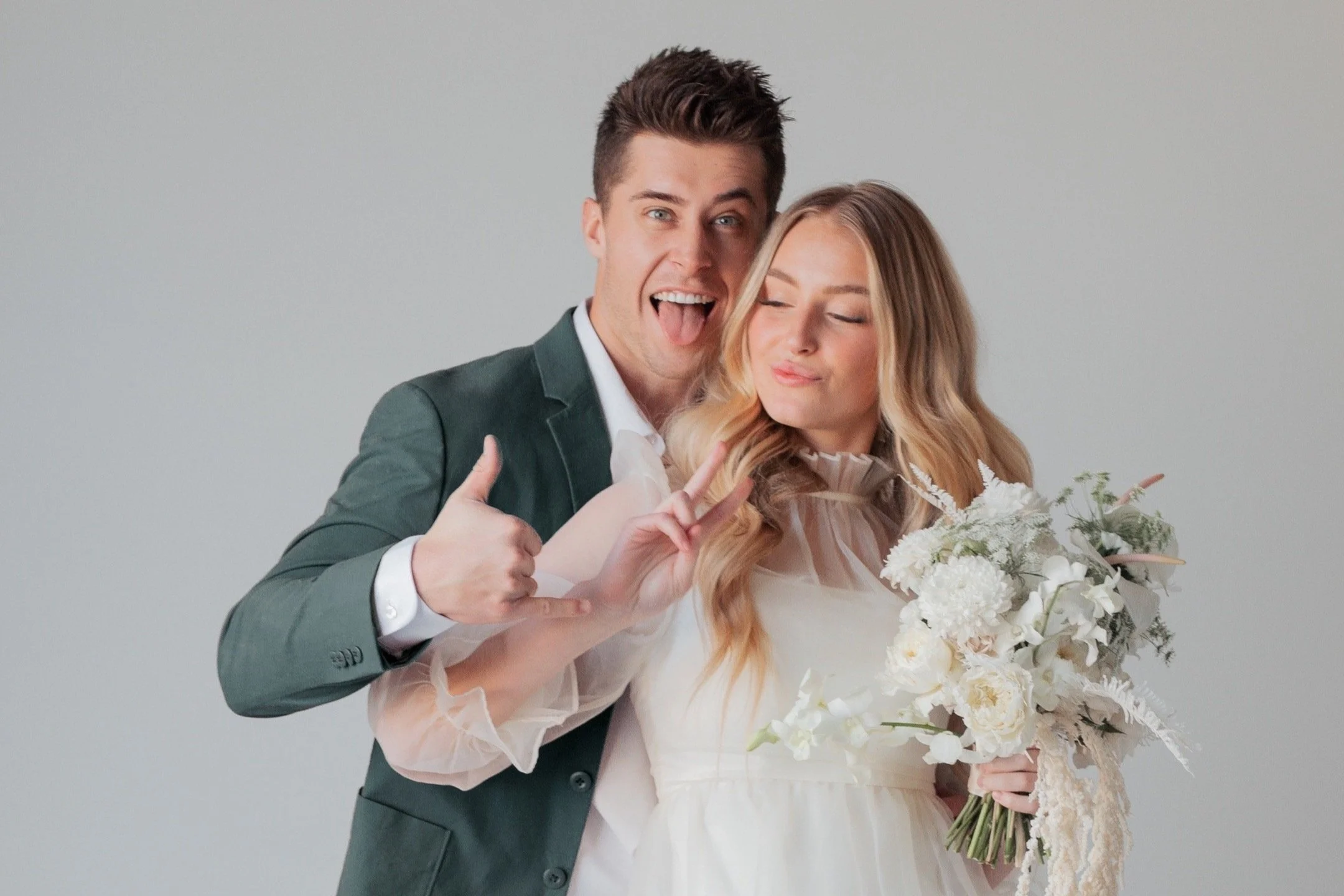 Bride and groom super happy and excited in a studio in Provo, Utah for bridals