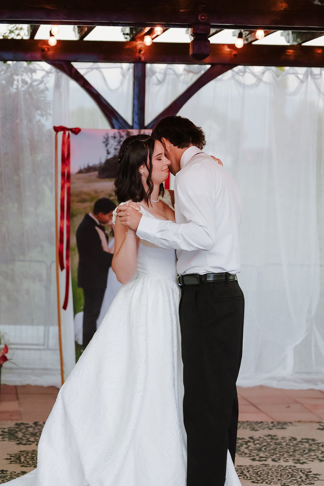 Photograph of a bride with her father at an LDS wedding reception in Syracuse, Utah