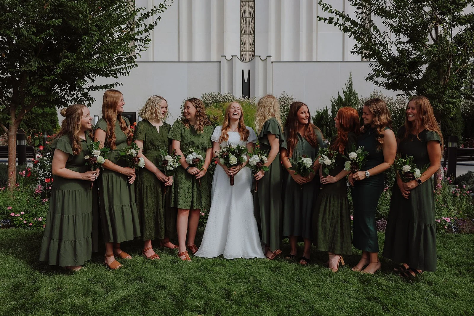 Bride with bridesmaid in green dress at the jordan river temple