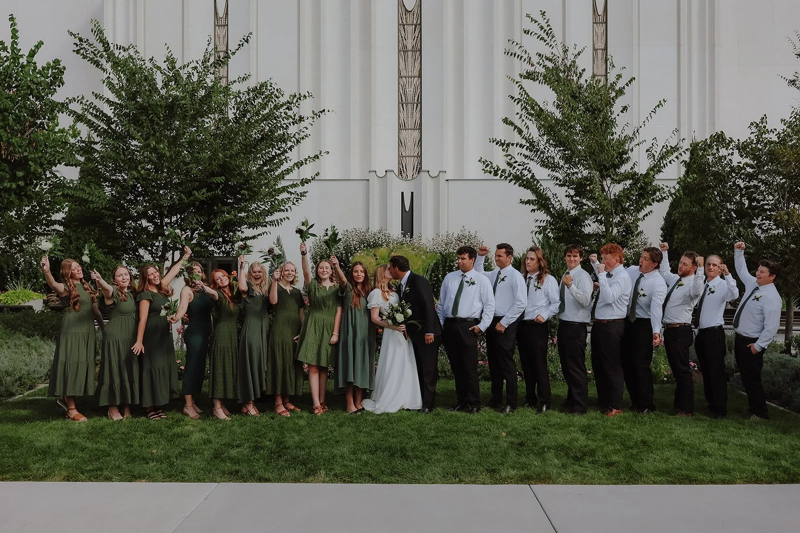 Bride with bridesmaid in green dress at the jordan river temple