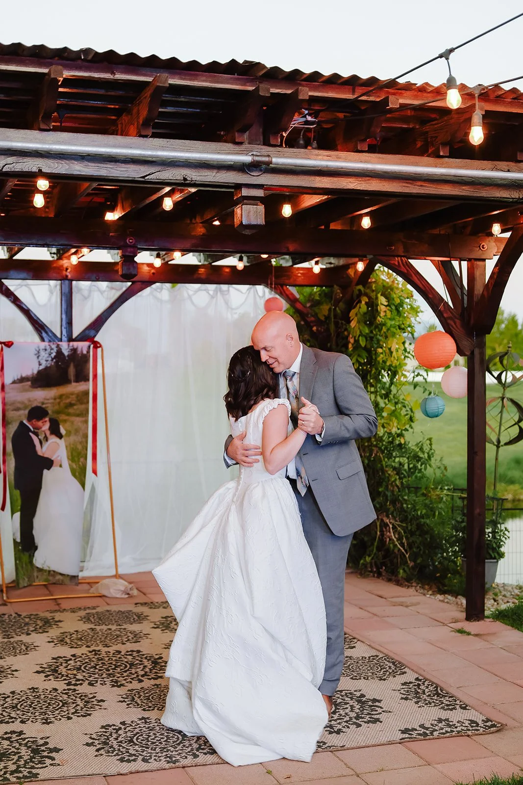 Photograph of a bride with her father at an LDS wedding reception in Syracuse, Utah