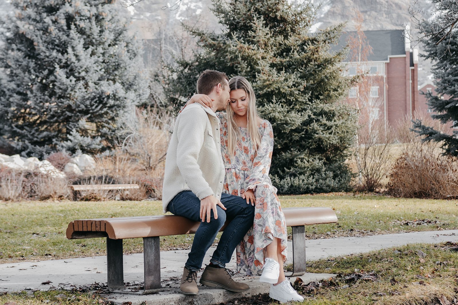 engagement couple by the Provo mountains on BYU's campus