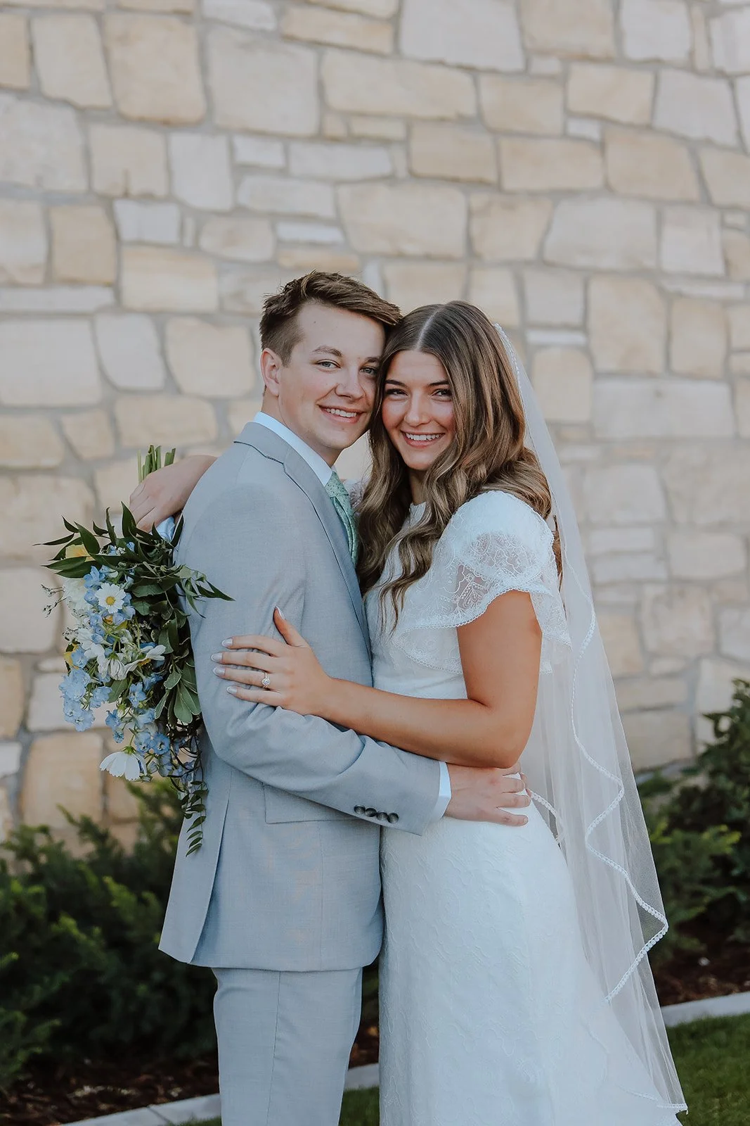 Photograph of a bride and a groom at the manti utah temple