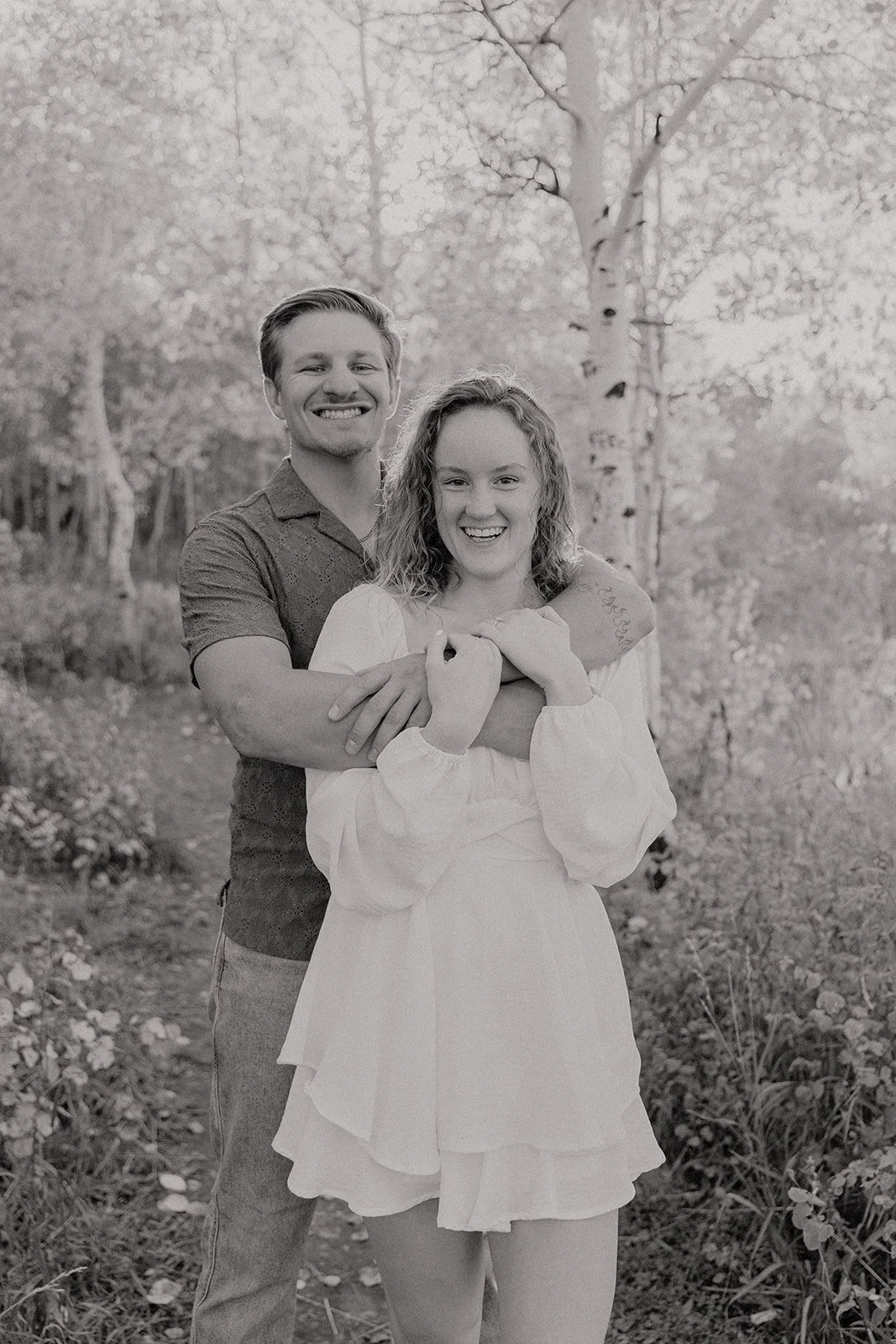 Photograph of a couple for their engagement photos up Spanish Fork canyon in the fall