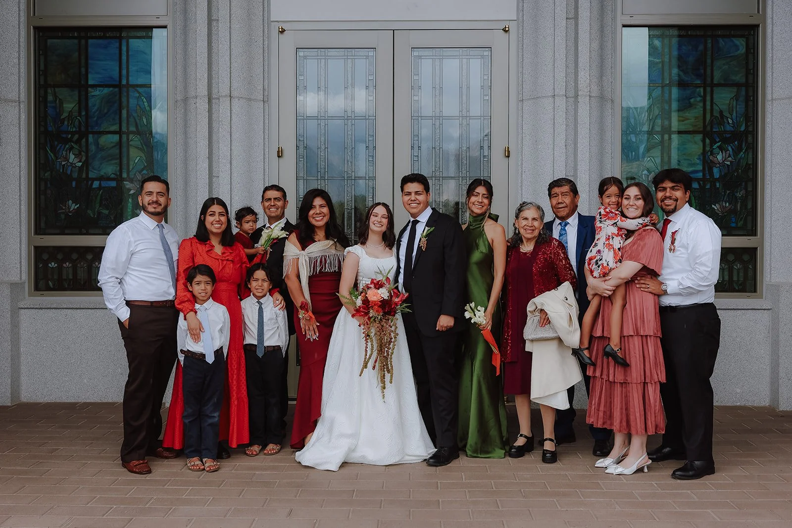 Photograph of family photos at the Orem Utah temple for a wedding