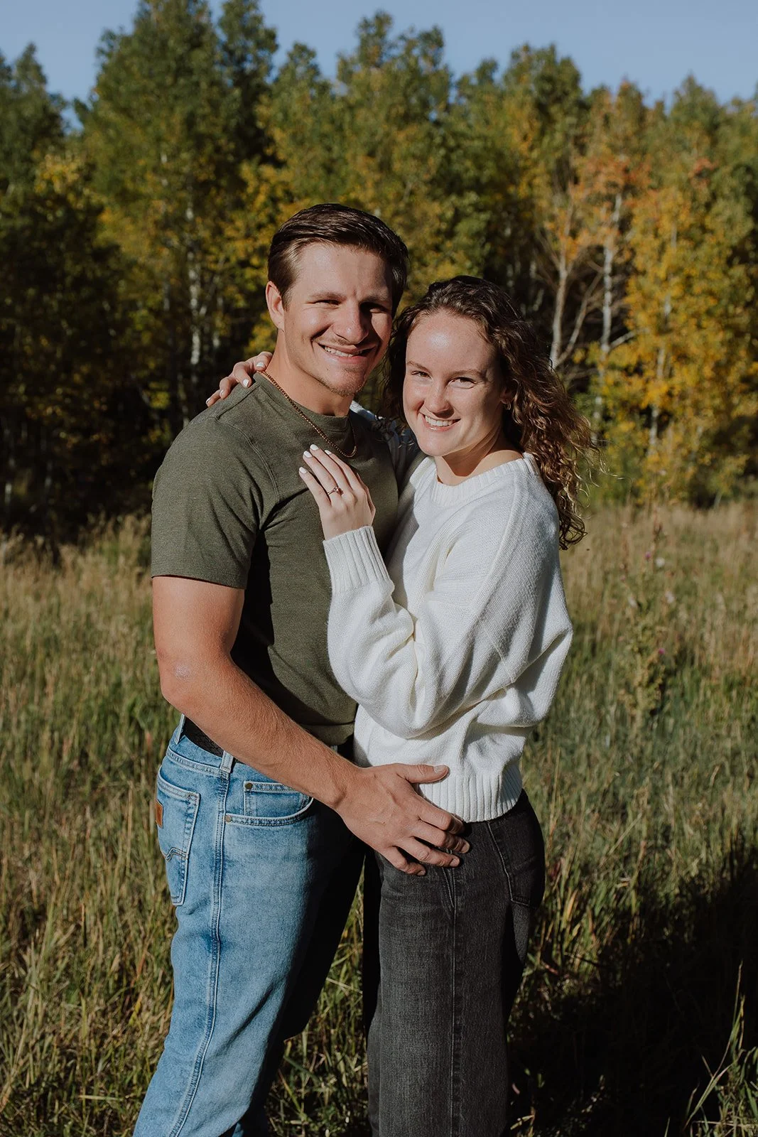 Photograph of a couple for their engagement photos up Spanish Fork canyon in the fall