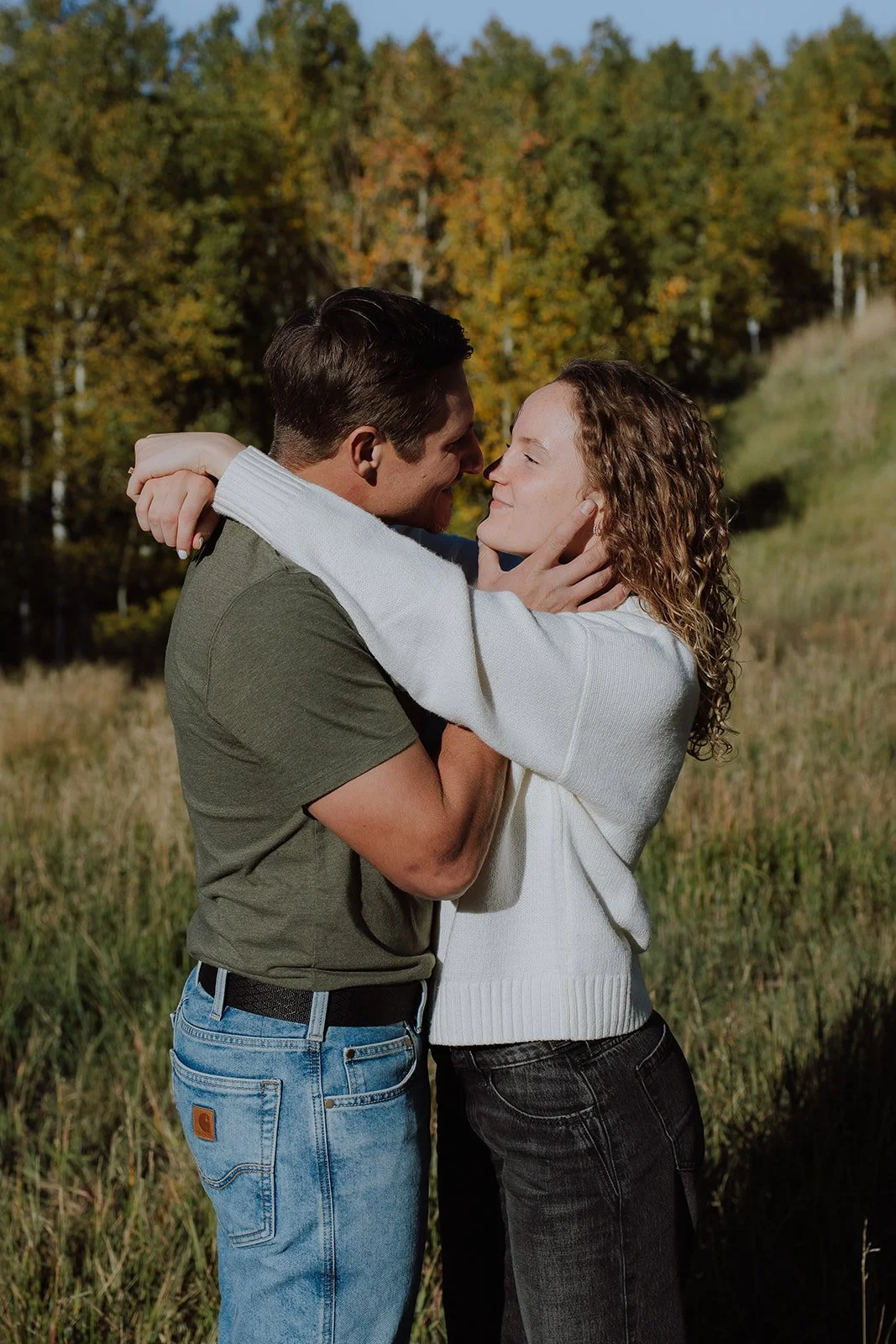 Photograph of a couple for their engagement photos up Spanish Fork canyon in the fall