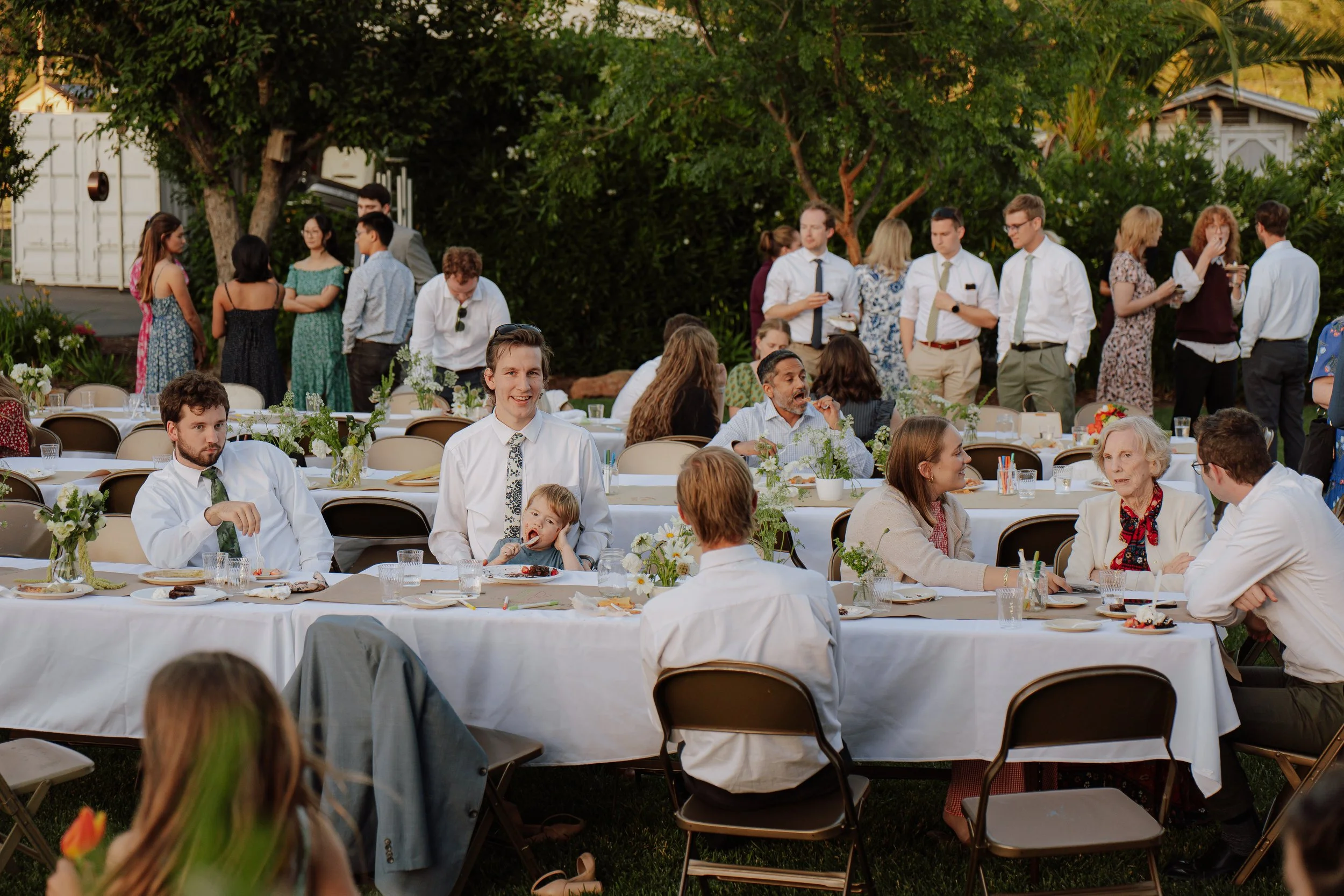 California Oakland temple LDS wedding photographer bride and groom bright florals red color theme Santa Rosa backyard wedding reception