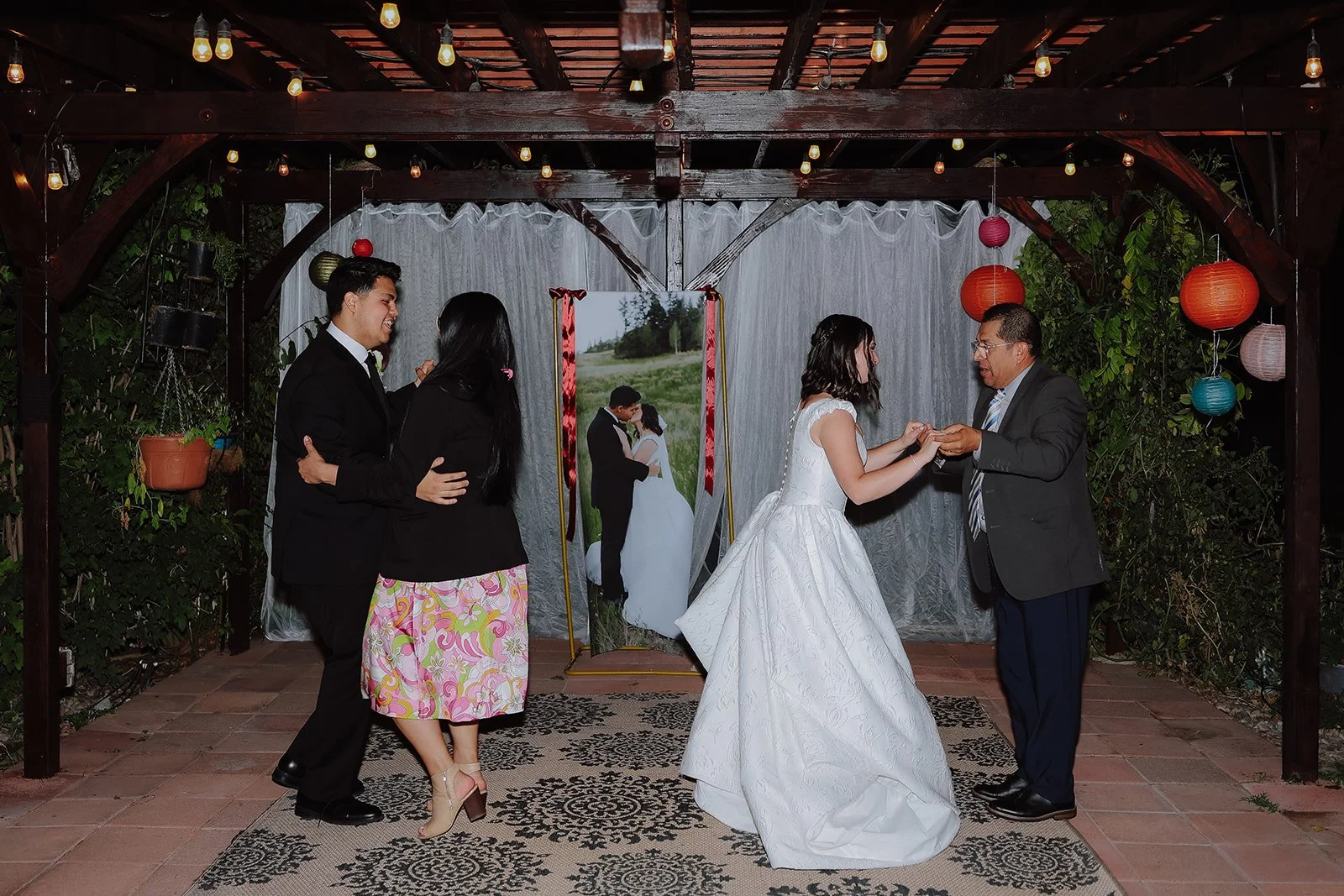 Photograph of a bride and a groom on the wedding dance floor