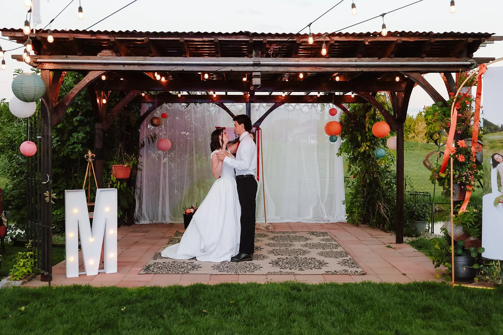Photograph of a bride with her father at an LDS wedding reception in Syracuse, Utah