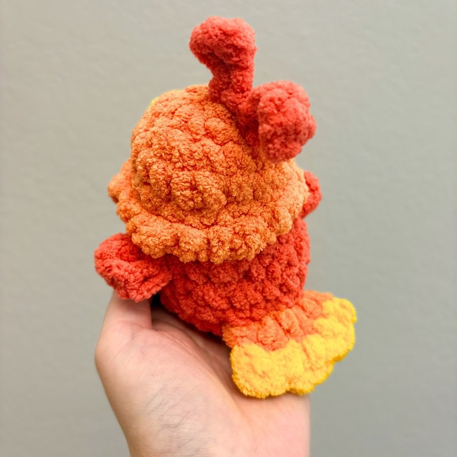 back view and tail view of little crochet phoenix - no sew free crochet pattern
