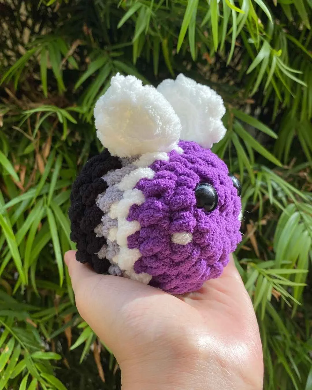 crochet asexual pride bee with colors of the asexual pride flag - free crochet pattern