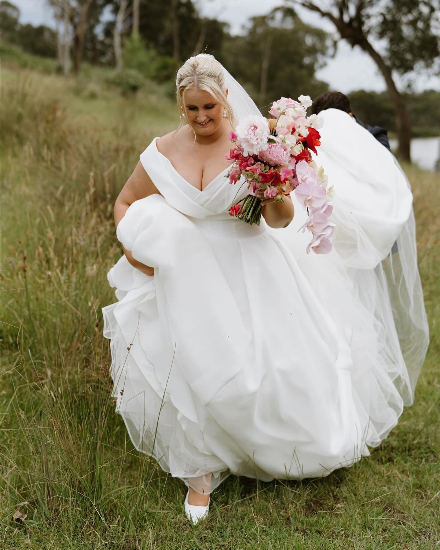 My beautiful Grace at her wedding to Tom out at  @thefarmyarravalley. I was looking through my feed last night at each couple&rsquo;s individual style for their day. 
.
Some brides have worn white, sometimes sleek and simple, sometimes the full Swan 