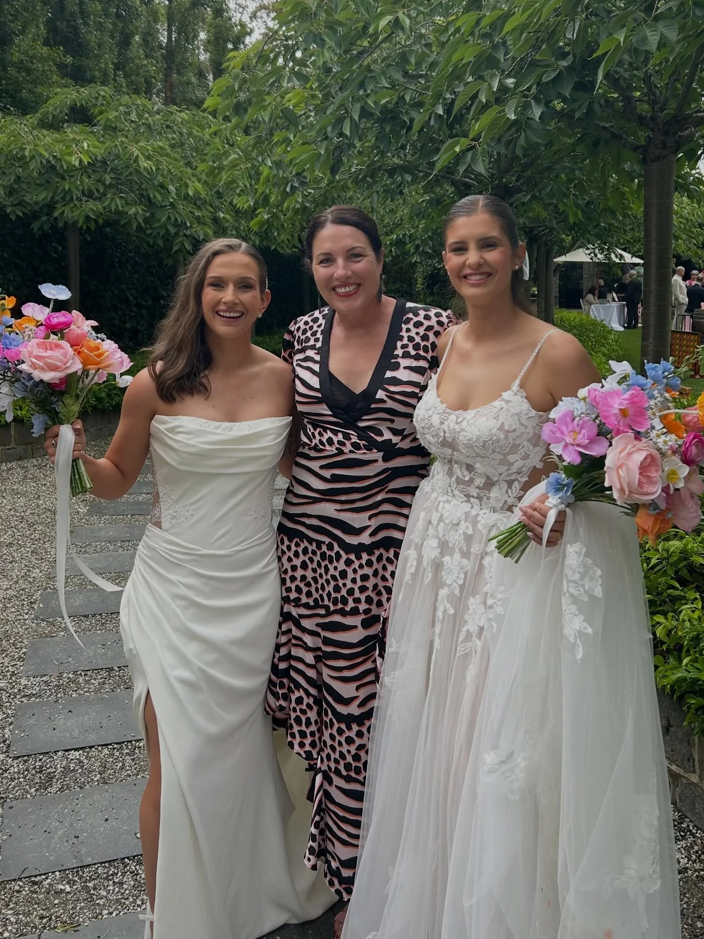 These two hotties are marrrrried! They were blessed with an outdoor ceremony in a very convenient window of rain abating. Their ceremony was funny and emotional.
.
Guests enjoyed pre drinks before wandering up through the absolutely stunning grounds 