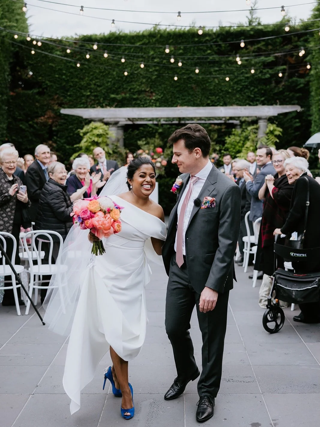 How can you not smile looking at these photos? 

Pure HAPPINESS, displayed by Kajal and Owen as they head back up the aisle married. She is the shiniest little sunbeam in some seriously hawt heels. 

This moment is so beautifully overwhelming as the 