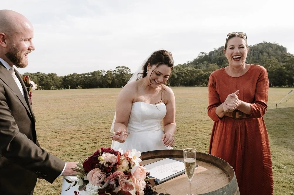 It&rsquo;s impossible to tell how much I love my couples isn&rsquo;t it? 
I couldn&rsquo;t pretend this if I tried! 
Real moments ftw.

Signing docs at Hanging Rock with Em and Steve. 
.
.
📷: @tessfollett 
.
#justmarried #macedonrangeswedding #maced