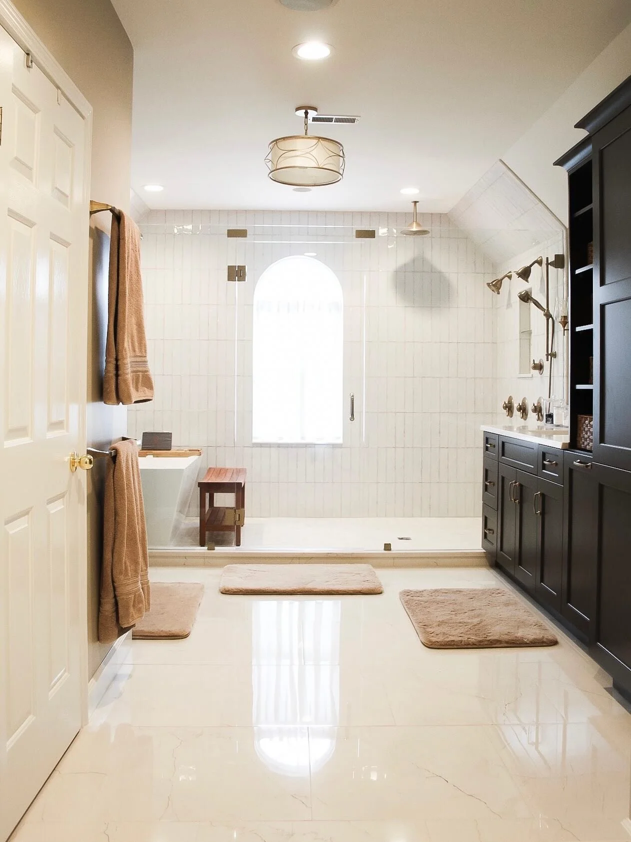 From closed-off to completely open 🤍
By removing walls and adding custom cabinetry, this primary bathroom now features a stunning full glass wall and tons of natural light.
This Matthews family is thrilled with their new space!