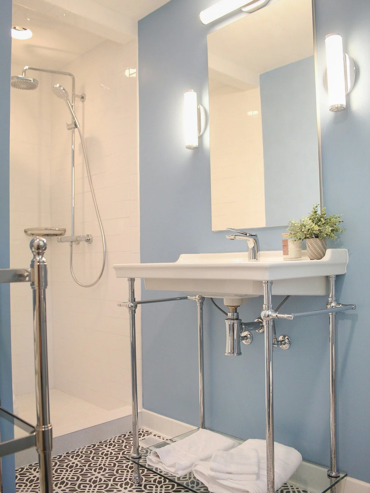 Loving the serene blue tones, chic tilework, and elegant silver fixtures in this Providence Plantation renovation 💙 🌿 
#HomeDecor #InteriorDesign #Relaxation #BathroomGoals #ChicStyle #TileDesign