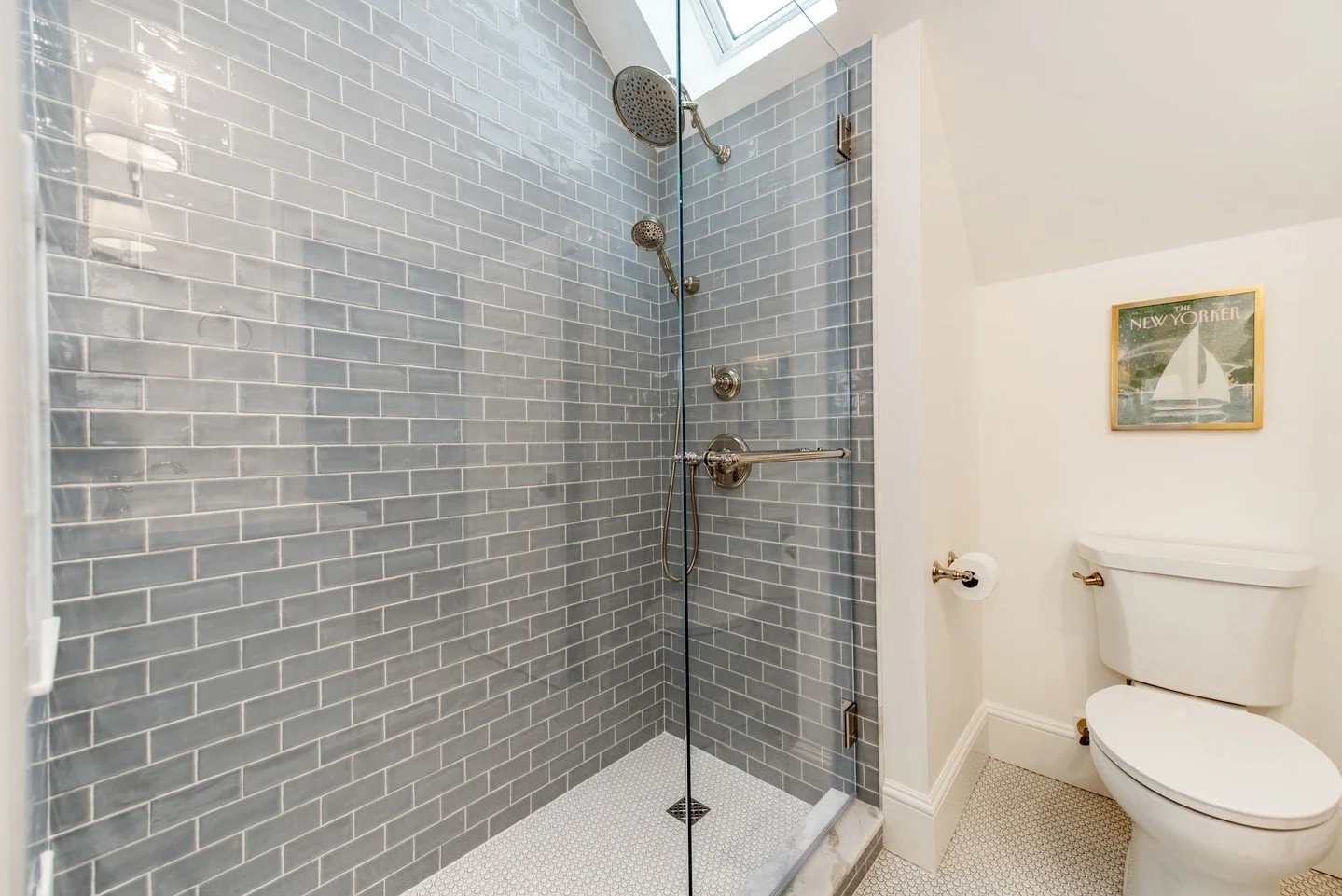 Soft blue tones and classic subway tile bring a calm, airy feel to this bathroom renovation near Carmel Country Club 💙 🚿

@thetileshop @topknobs @harkeytileandstone @fergusonhomeofficial @showerdoorsofcharlotte 

#BathroomRenovation #HomeDecor #Car