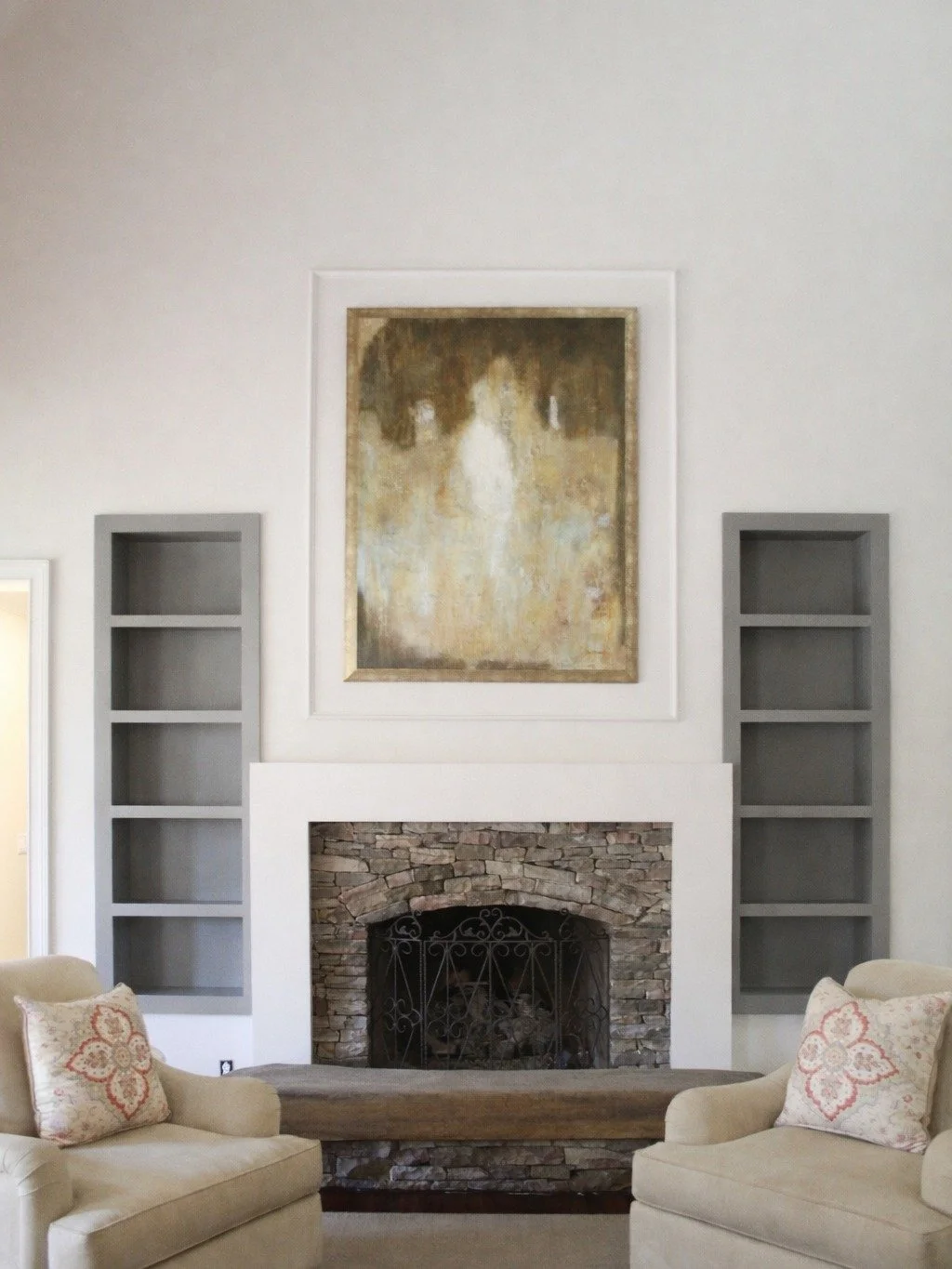After✨&mdash;> Before

This Foxcroft home in South Park once had a wall of unused doors breaking up the space. By rethinking the layout and fireplace wall, the room is now functional, balanced, and designed for gathering.
