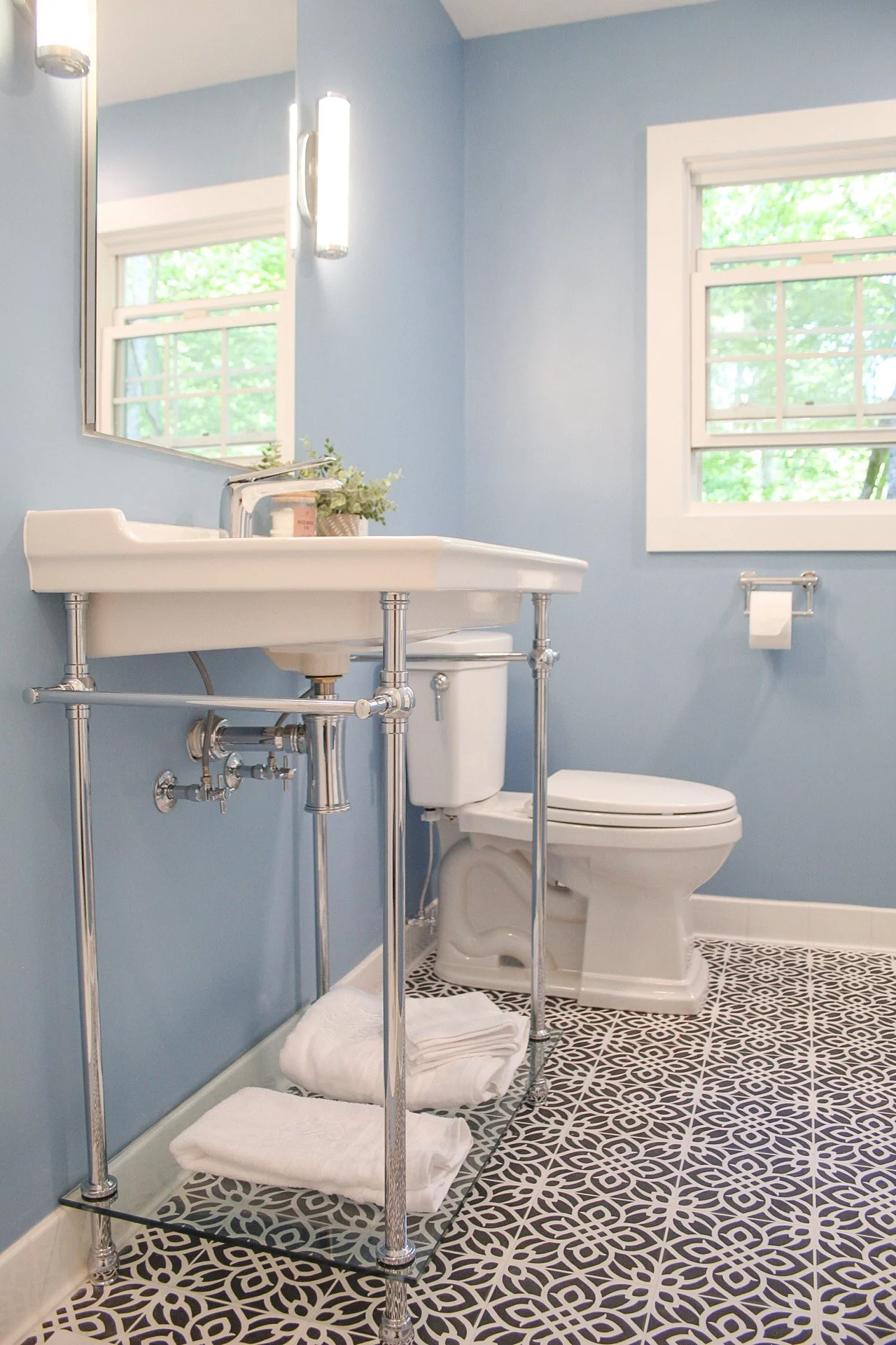 Providence Plantation Bathroom Renovation Featuring a Pedestal sink and artful tilework.
