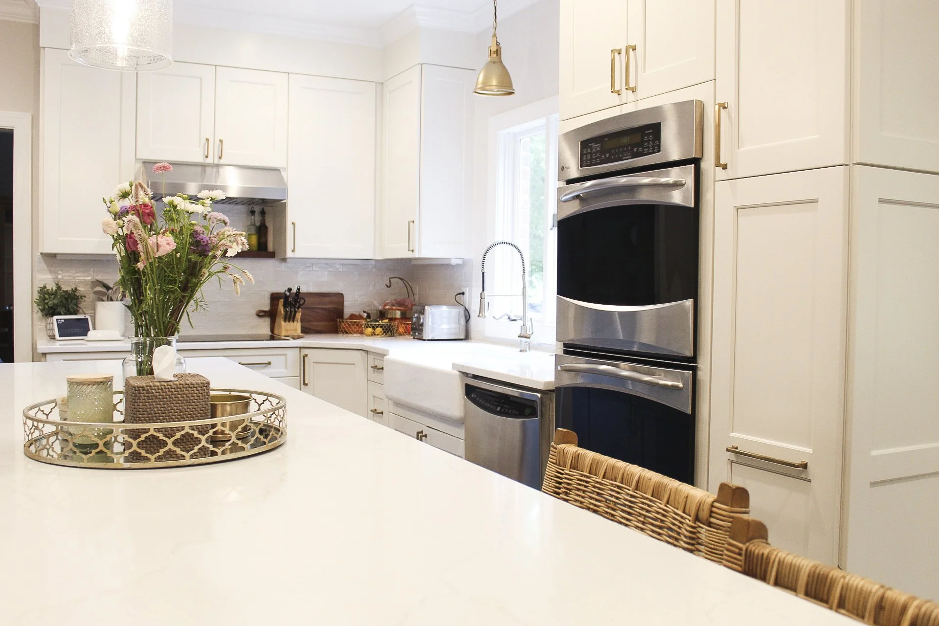 South Park Kitchen Renovation with Custom white cabinets and quartz countertops
