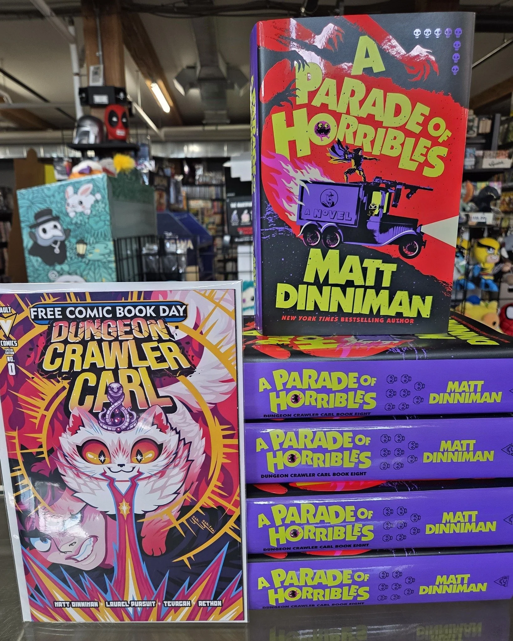Happy New Dungeon Crawler Carl release day! Get a copy of the Free Comic Book Day Dungeon Crawler Carl when you buy your copy of Parade of Horribled from us!!