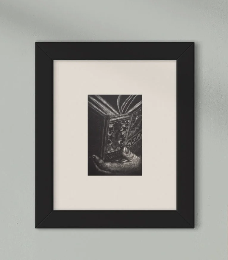 Knowledge mezzotint print showing a child's hand holding a book from the Secret Garden series