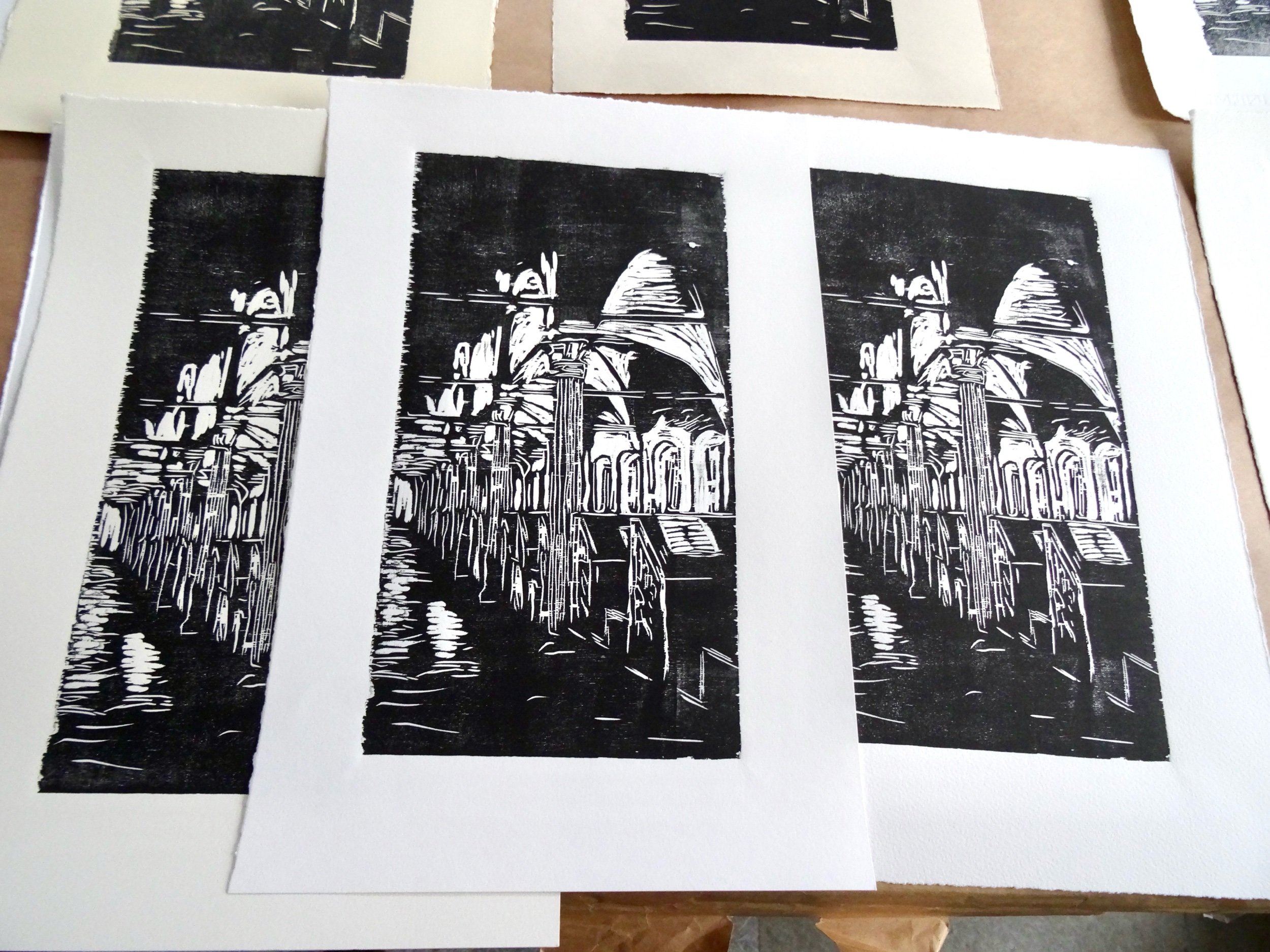 woodcut print in black and white of a medieval library