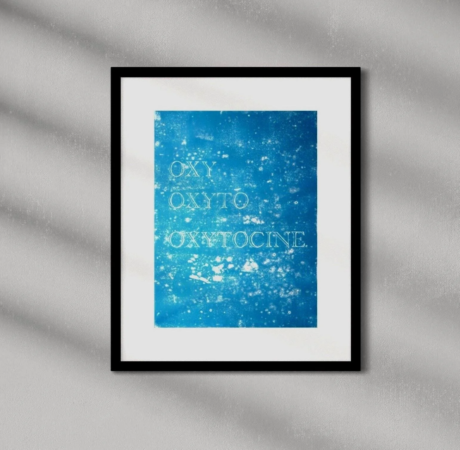 Tilknytning (Oxytocin) hand-printed blue linocut on translucent parchment paper with expressive typography
