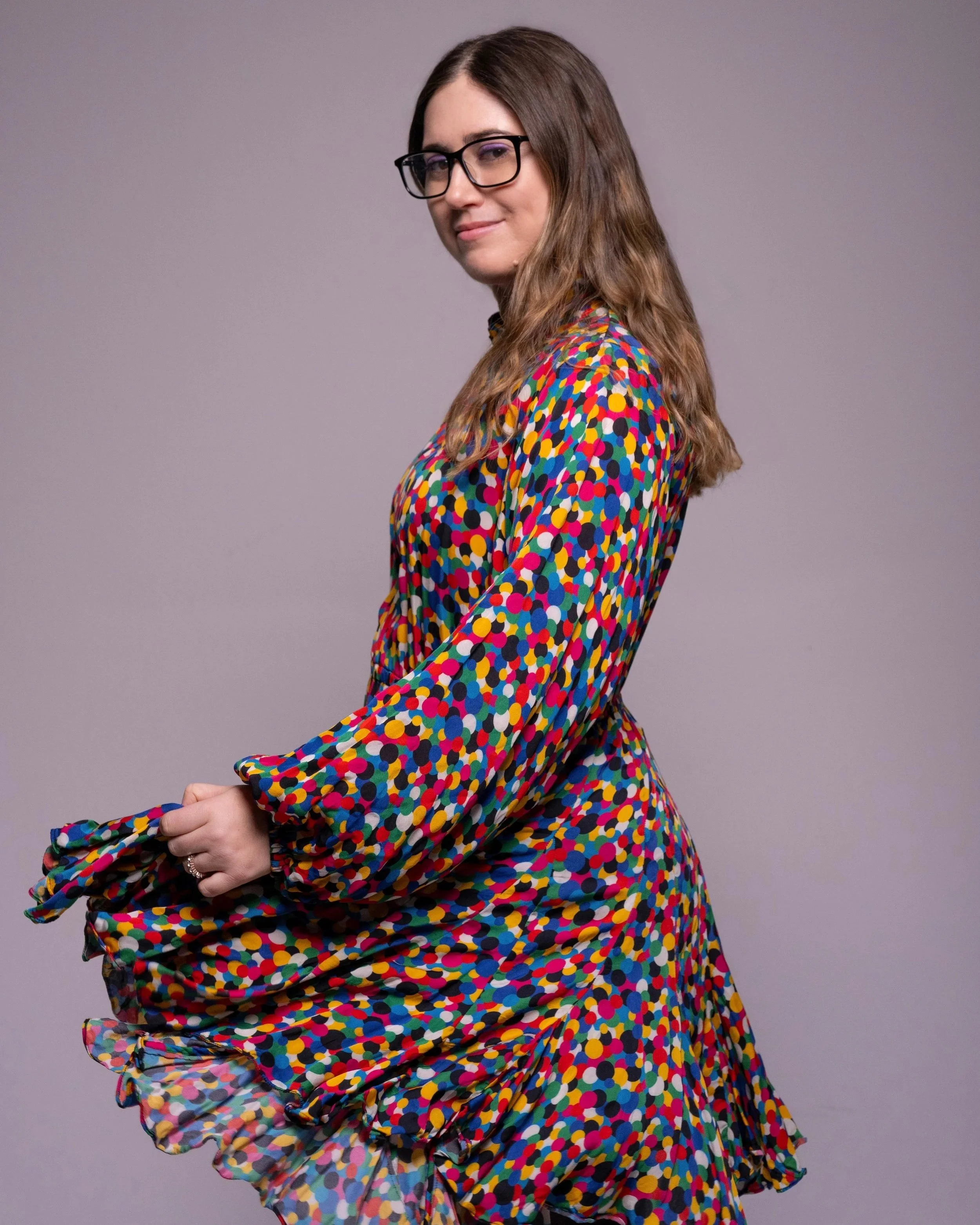 Headshot of UX Writer and Content Designer Emily Polner